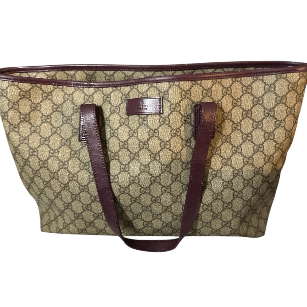 Gucci cream and eggplant signature large  Tote no call outs very nicely used bag